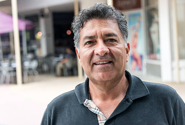 mature hispanic man smiling